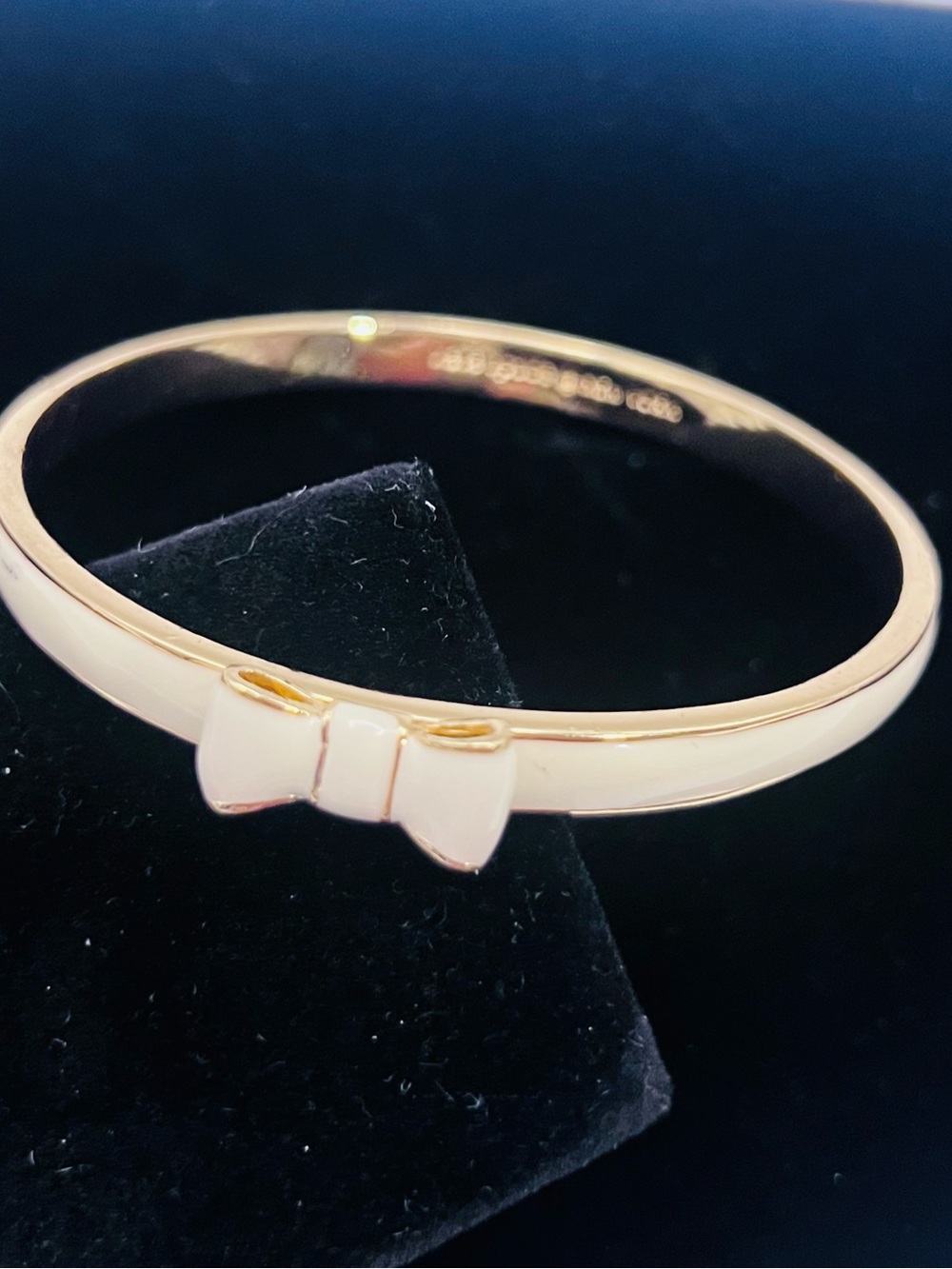 kate spade Gold-Tone Bangle with White Enamel Bow